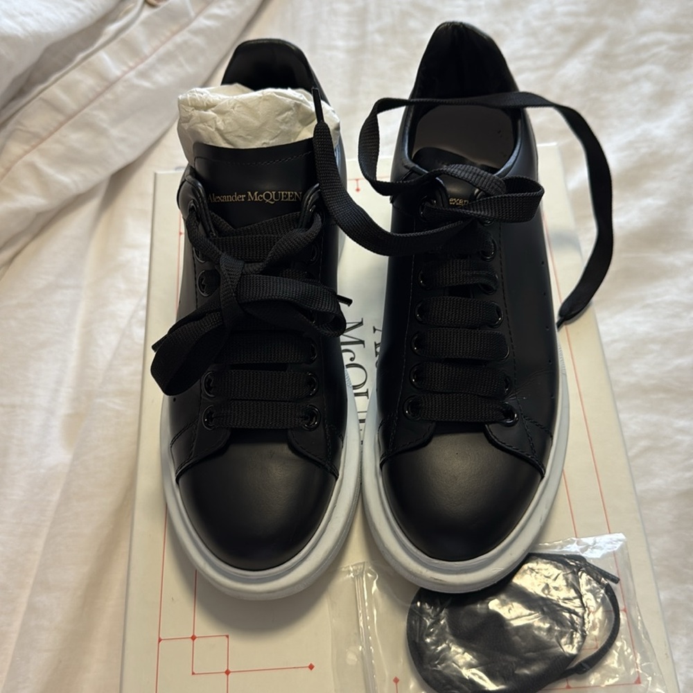 Alexander McQueen Black and White womens Sneakers. Will wipe off dirt spot